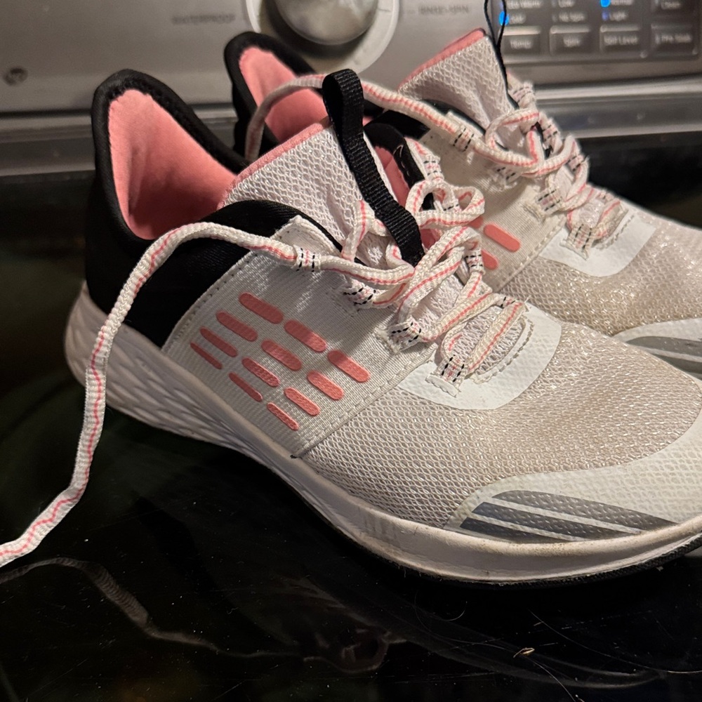 White and Pink Athletic Shoes